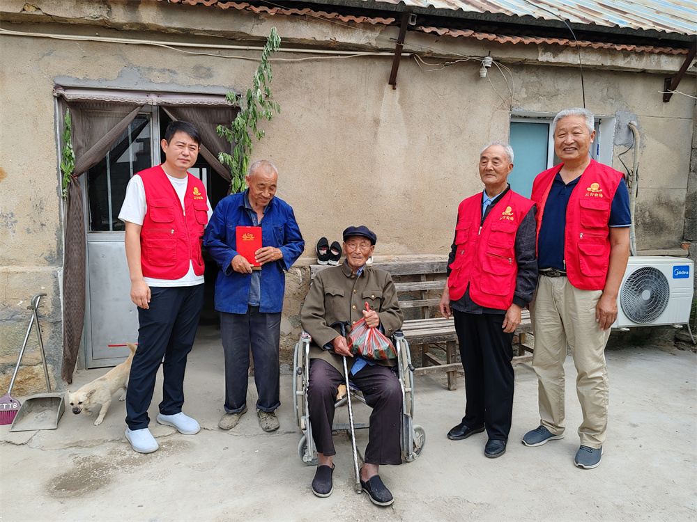 20240607 云台农场残联开展端午包粽子送温暖活动.jpg